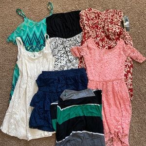 A group of dresses and skirts